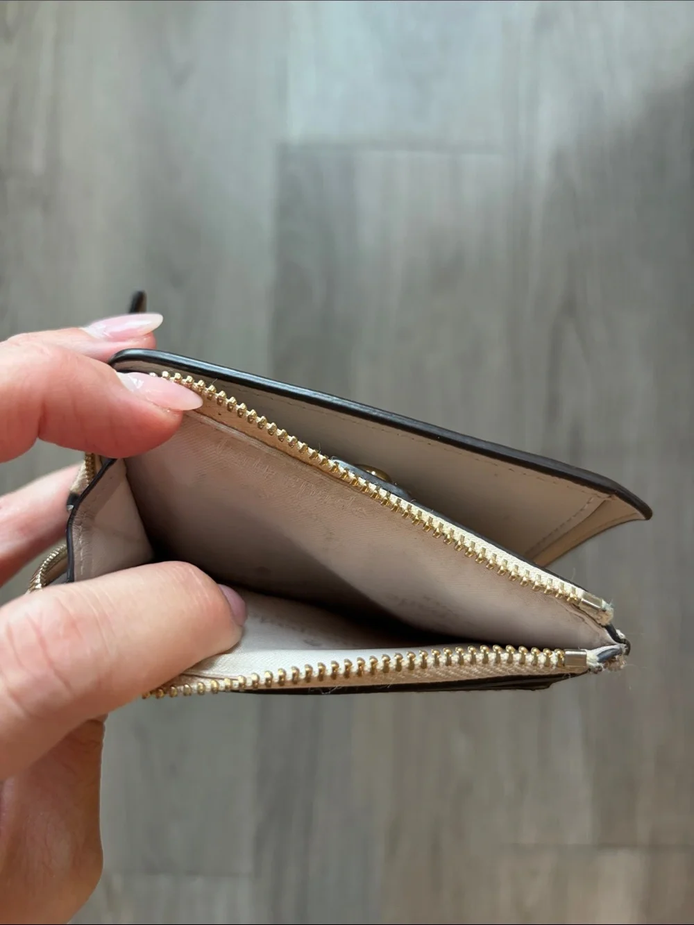 kate spade metallic rose gold zip-around wallet